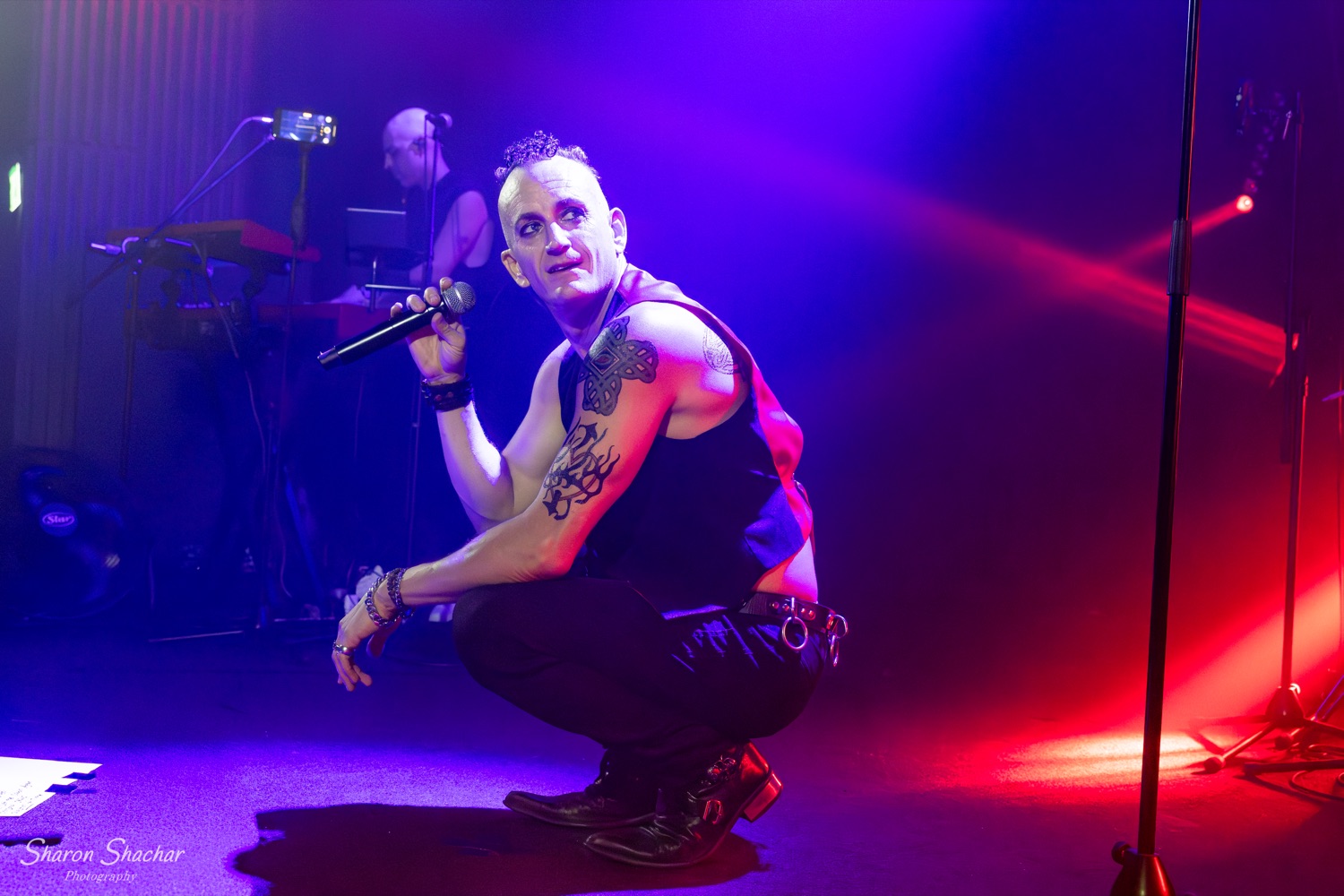 Olive Shows Depeche Mode tribute - vocalist in a waistcoat at the microphone