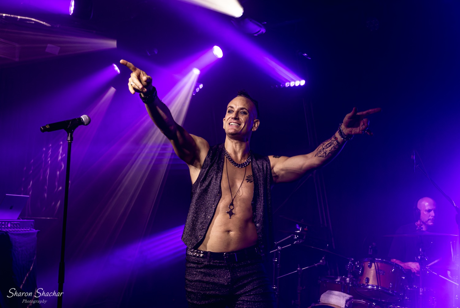 Olive Shows Depeche Mode tribute - vocalist reaching to the crowd